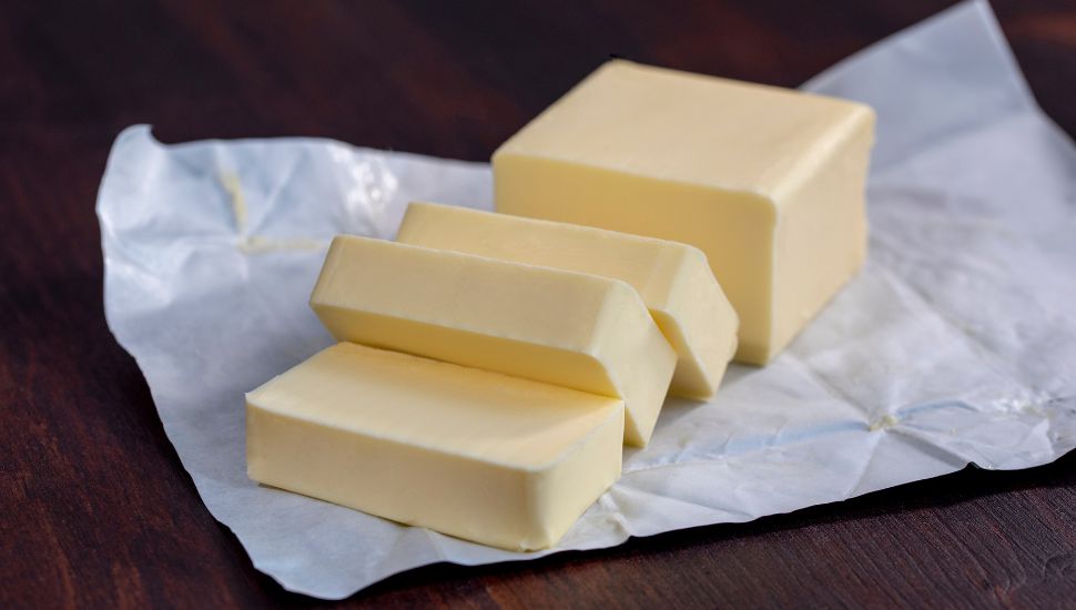 Image of a butter cube sliced in pieces
