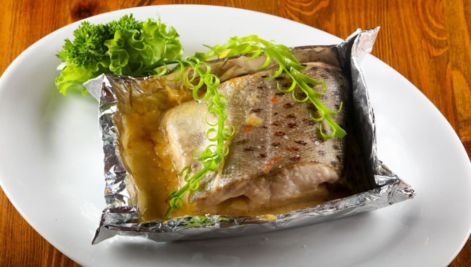 Salmon wrapped in a foil for baking