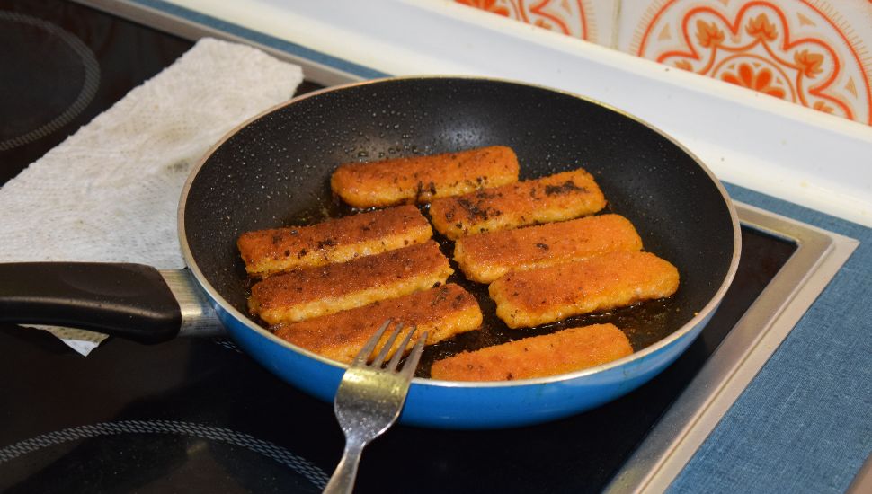 cooking Fish Fingers on pan