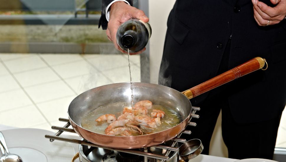 cooking prawns on a stovetop