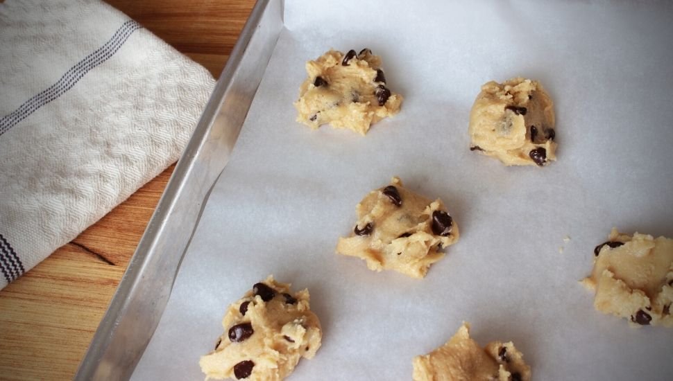 placing cookies on pan for baking