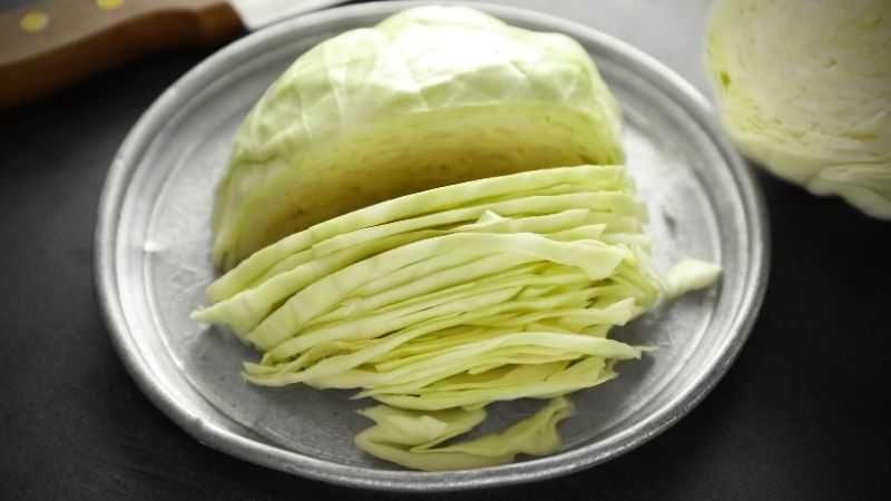 half sliced cabbage on plate
