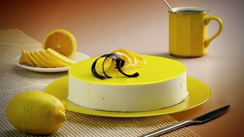 image of a cake with lemon toppings