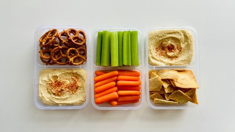 image of hummus in plastic containers