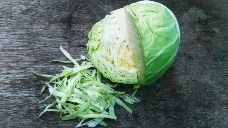 image of sliced and whole cabbage