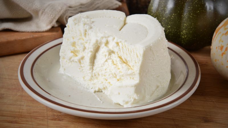 half piece of Ricotta Cheese in plate