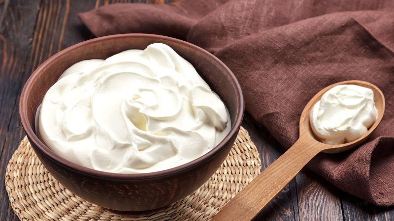 image of Sour Cream in wooden bowl