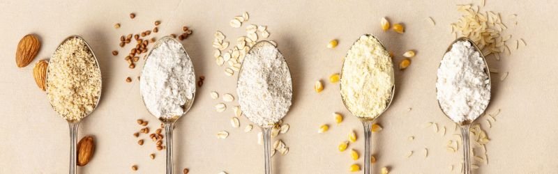 image of five different flours in spoon