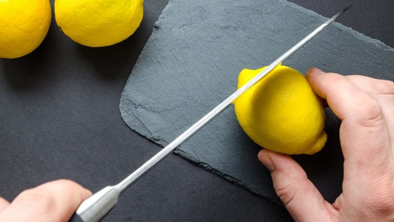 image of slicing lemon with knife