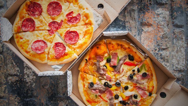 image of two pizzas in box