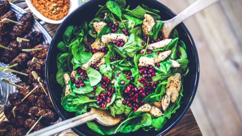 top view of spinach and chicken salad