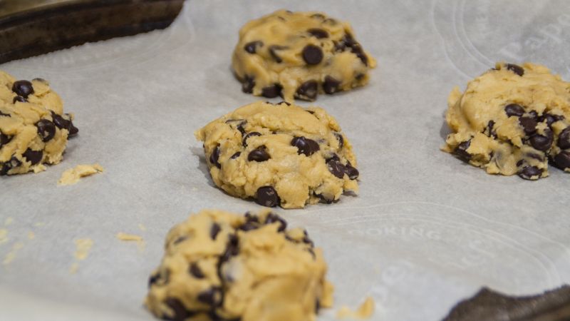 close up image of cookie dough placed on sheet