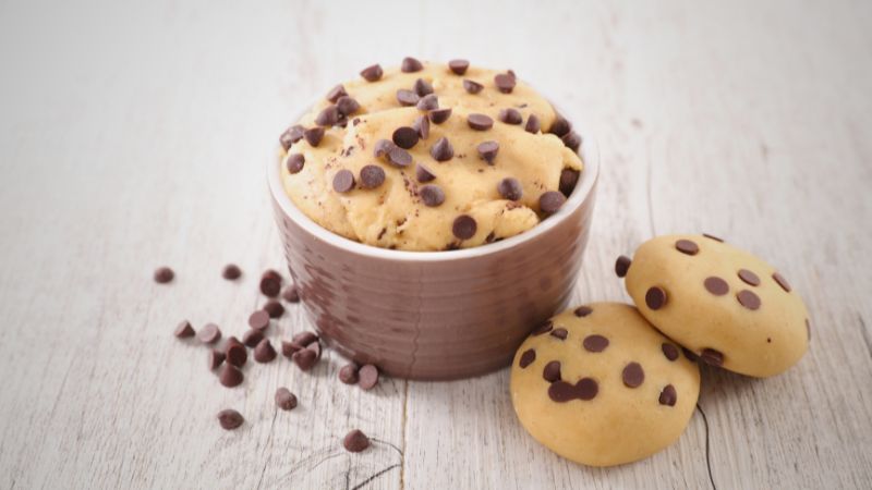 cookie dough sprinkled on chocolate chips
