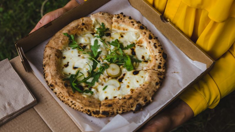 image of a fresh pizza in a cardboard box