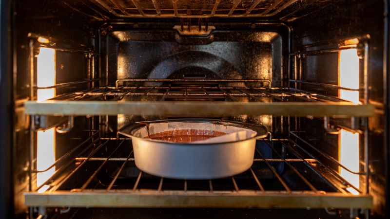 image of cake inside oven