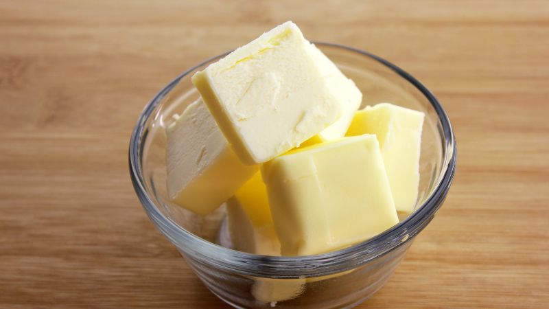 slices of butter in bowl